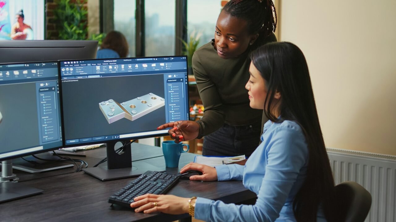 creative agency diverse team editing video footage using color grading
